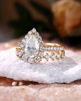 QUINTESSA Halo Pear Shaped Moissanite Engagement Ring Set 2PCS